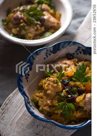 Two ceramic bowl with pilaf on a stand 28652656