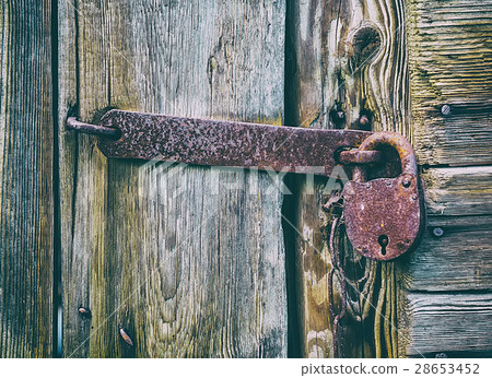 old metallic padlock old metallic padlock 28653452