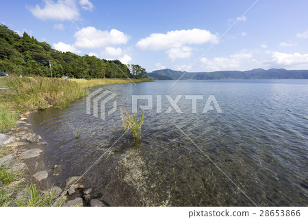 Kyushu's largest caldera lake Ikeda lake flowing mineral rich and beautiful water from the mountains in every direction, the lake bottom volcano inhabited by natural large eel Kyushu's largest caldera lake Ikeda lake flowing mineral rich and beautiful water from the mountains in every direction, the lake bottom volcano inhabited by natural large eel 28653866