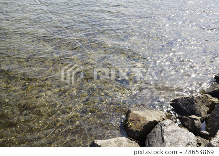 Kyushu's largest caldera lake Ikeda lake flowing mineral rich and beautiful water from the mountains in every direction, the lake bottom volcano inhabited by natural large eel 28653869
