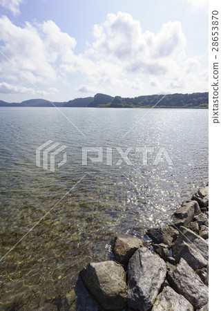 Kyushu's largest caldera lake Ikeda lake flowing mineral rich and beautiful water from the mountains in every direction, the lake bottom volcano inhabited by natural large eel 28653870
