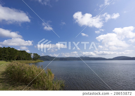 Kyushu's largest caldera lake Ikeda lake flowing mineral rich and beautiful water from the mountains in every direction, the lake bottom volcano inhabited by natural large eel 28653872