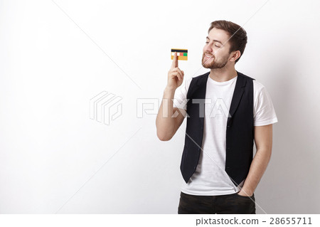 young handsome man with beard in white shirt and 28655711