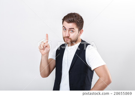young man with a beard in white shirt and black 28655869