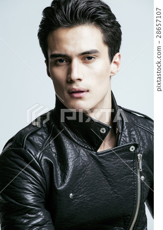young handsome man, leather jacked on naked torso 28657107