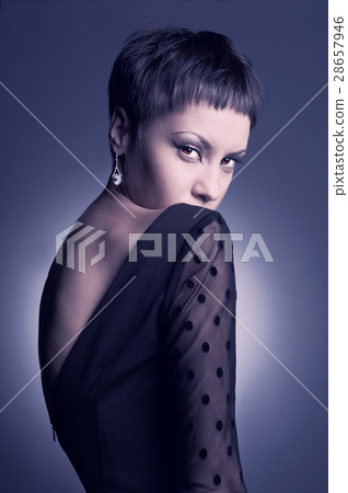 Young beautiful lady in elegant dress 28657946