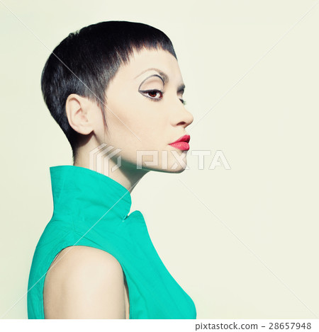 Elegant lady with short hairstyle Elegant lady with short hairstyle 28657948