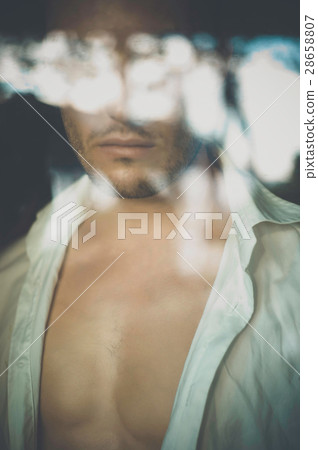 Portrait of man through the window Portrait of man through the window 28658807