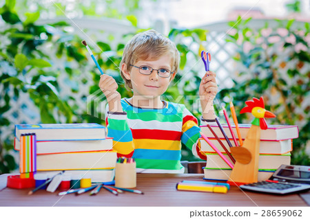 little school kid boy with glasses holding wax 28659062