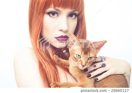Beautiful lady with Abyssinian cat 28660127