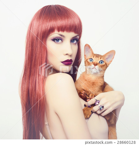 Beautiful lady with Abyssinian cat 28660128
