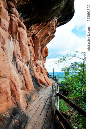 Wooden walkway around sandstone the mountain. 28660892