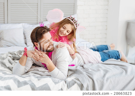 Relaxed man lying on the bed Relaxed man lying on the bed 28663823