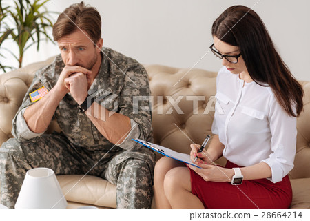 Unhappy thoughtful man holding his chin 28664214