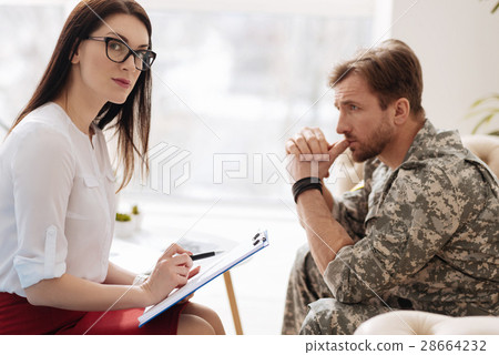 Good looking attractive psychologist working with 28664232