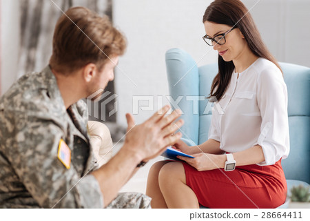 Pleasant attractive psychologist working in her 28664411