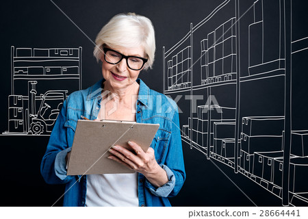 Positive intelligent woman working at the post 28664441