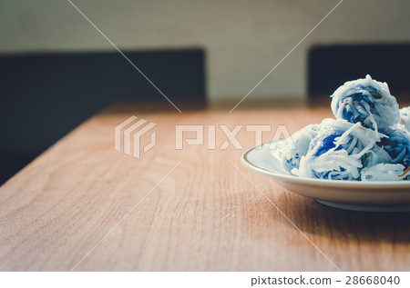 Thai dessert Coconut munchkins in white dish Thai dessert Coconut munchkins in white dish 28668040