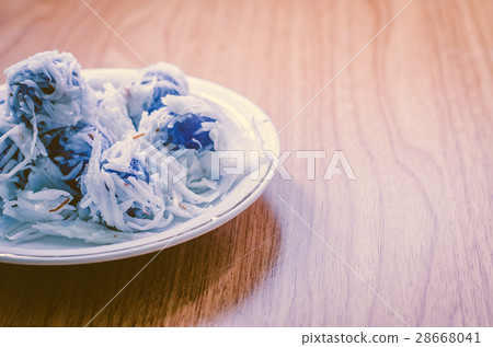 Thai dessert Coconut munchkins in white dish Thai dessert Coconut munchkins in white dish 28668041