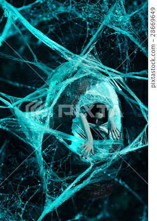 Woman in cocoon Woman in cocoon 28669649