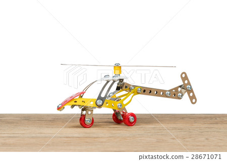 The toy metal helicopter on white 28671071