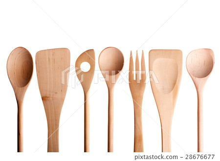 Wooden spoon, spatula, fork on a white background. 28676677