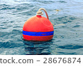 Orange buoy on blue sea 28676874