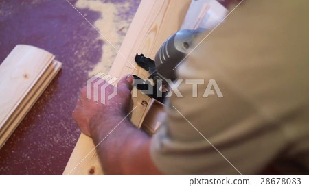 man sawing boards electric jigsaw man sawing boards electric jigsaw 28678083