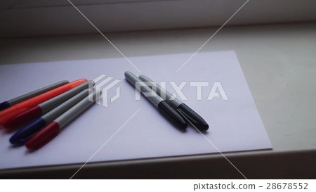 colored markers on a white sheet colored markers on a white sheet 28678552