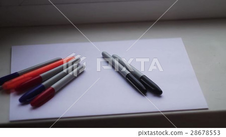 colored markers on a white sheet colored markers on a white sheet 28678553