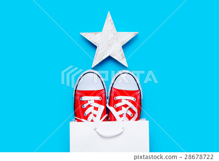 big red gumshoes in cool shopping bag 28678722