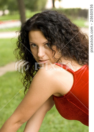 smiling brunet woman in red smiling brunet woman in red 28680936