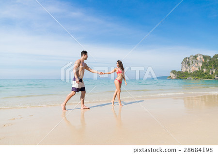 Couple On Beach Summer Vacation, Young People In Couple On Beach Summer Vacation, Young People In 28684198