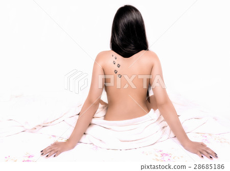 Backside of naked brunette woman Backside of naked brunette woman 28685186