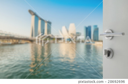 opened door to skyline of singapore cityscape 28692696