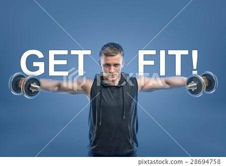 A fit man with his hands holding dumbbells and Get A fit man with his hands holding dumbbells and Get 28694758