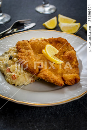 Schnitzel with salad 28696404