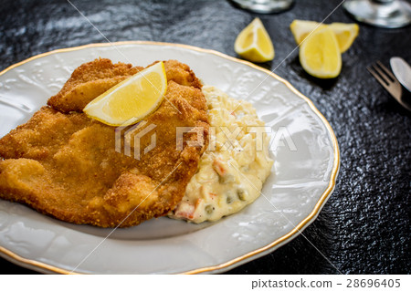 Schnitzel with salad 28696405