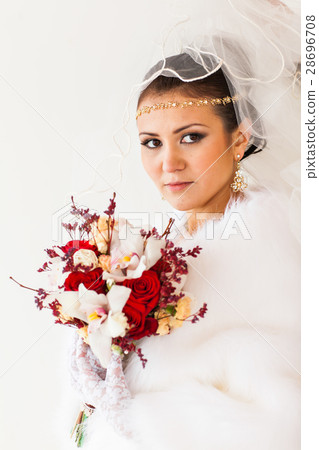 Portrait of bride with the flower bouquet in 28696708