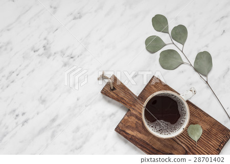 Cup of coffee on a marble surface with copy-space Cup of coffee on a marble surface with copy-space 28701402