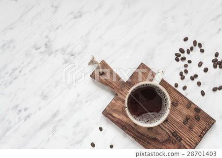 Cup of coffee on a marble surface with copy-space 28701403
