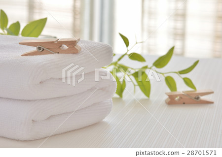 White towel and clothespin 28701571