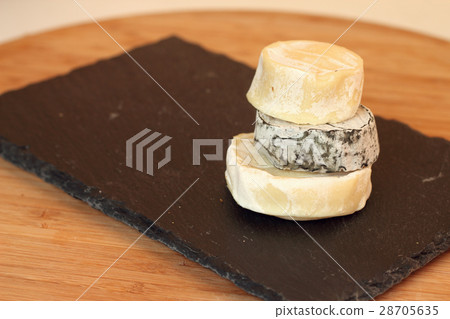 Stack of camembert cheese Stack of camembert cheese 28705635