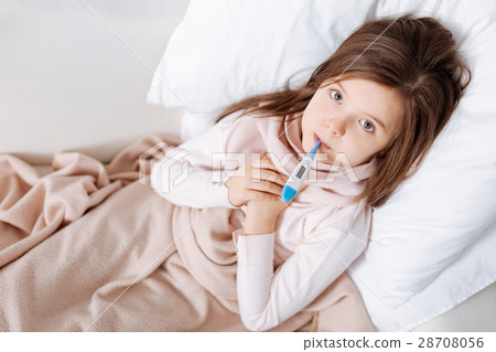 Pleasant ill girl lying in bed Pleasant ill girl lying in bed 28708056