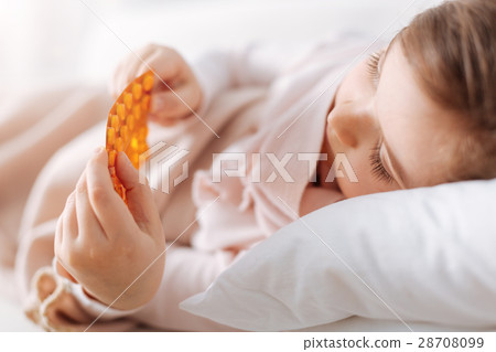 Cute sick girl taking pills Cute sick girl taking pills 28708099