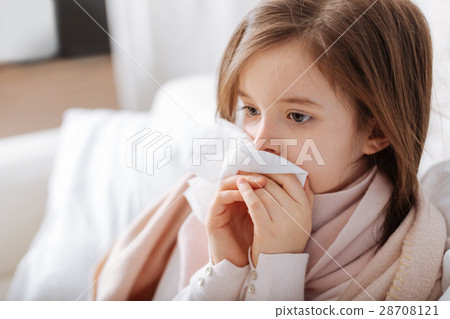 Pleasant ill little girk using handkerchief Pleasant ill little girk using handkerchief 28708121
