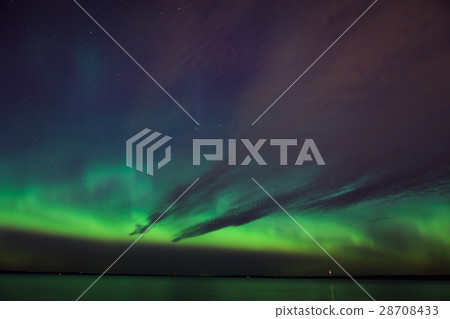 Northern lights over lake in finland Northern lights over lake in finland 28708433