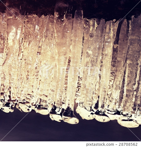 Winter creek  with icicles above freeze  stream 28708562