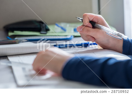 Junior high school students studying for exam 28710932