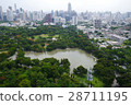 park with cityscape in the morning in Bangkok 28711195